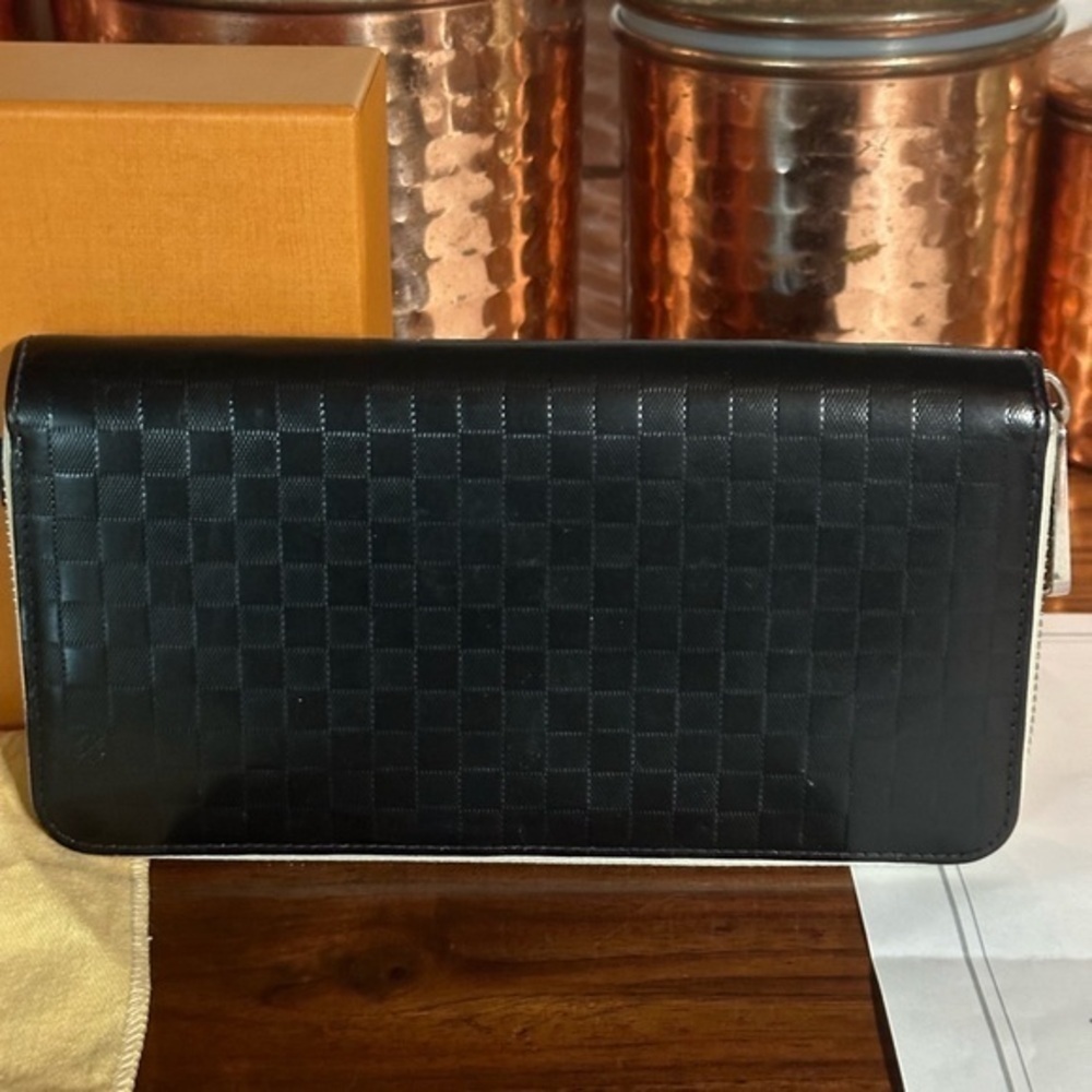 Louis Vuitton black wallet with dust bag COA and box